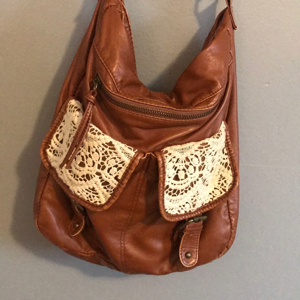 Brown handbag with crochet pockets